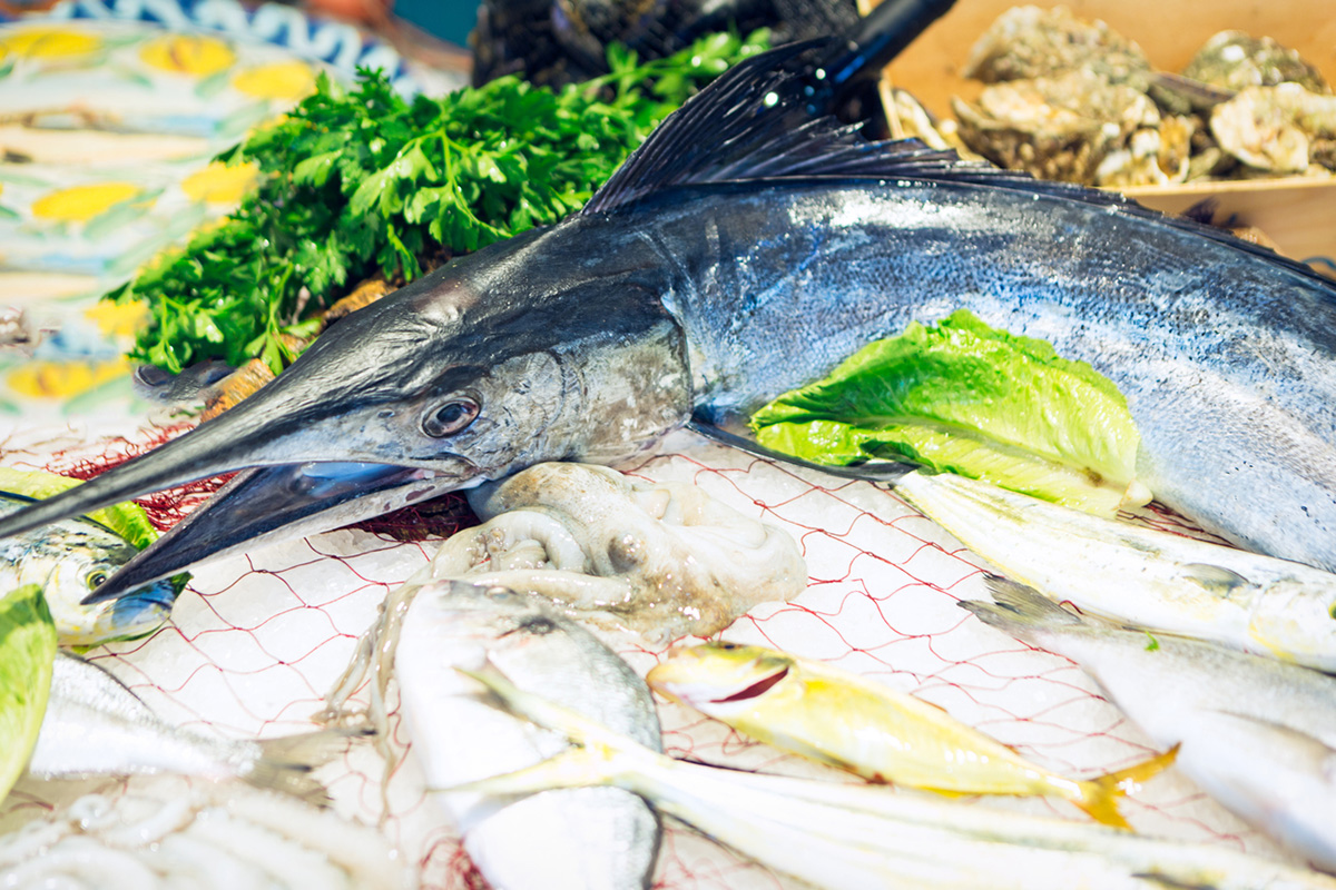 Fresh fish on a fish market stall. Siracusa, Italia
